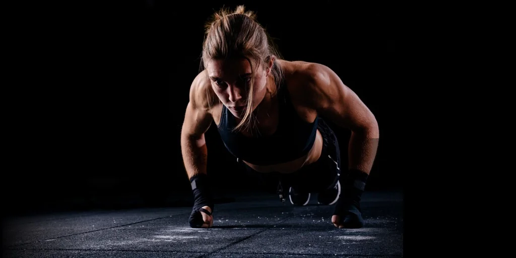 An image shows the FitVo app. FitVo provides personalised and adaptive exercise routines that evolve with your fitness level. Milo Creative develops lifestyle web and mobile apps. From e-commerce to cooking, from fitness to travel.